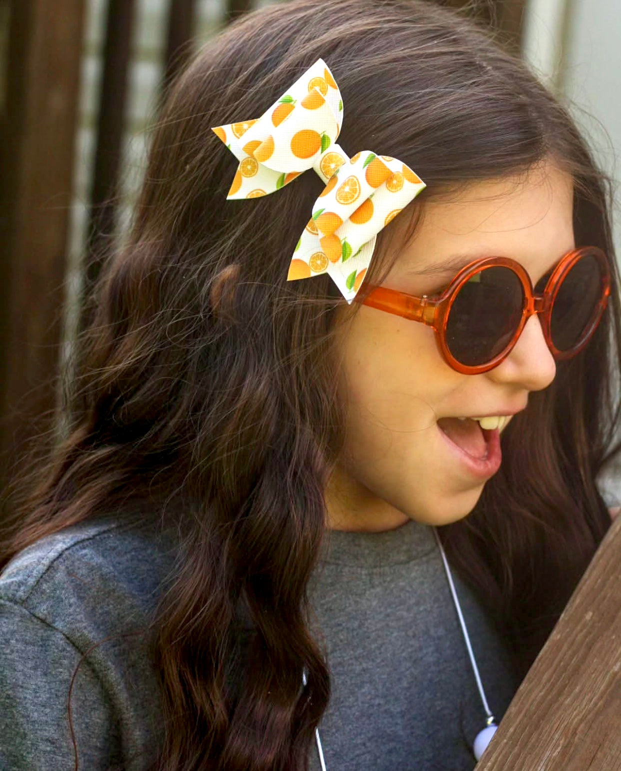 Orange print pigtail bows